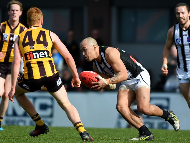 Alex Woodward collects another possession. Picture: James Ross/AAP