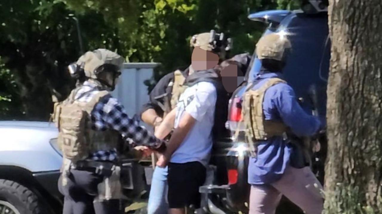 Watch: Armed police take man into custody after regional Qld standoff