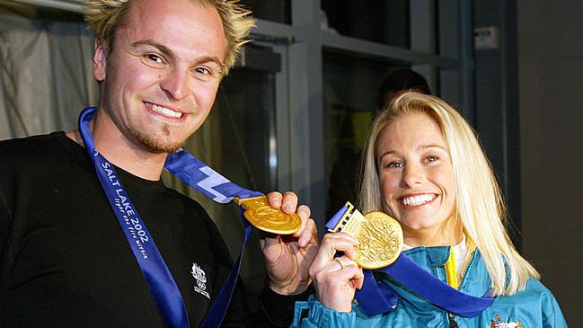 Steven Bradbury Alisa Camplin display their Winter Olympic gold medals in Salt Lake City. Picture: Sport The Library/Mark Ashkanasy.