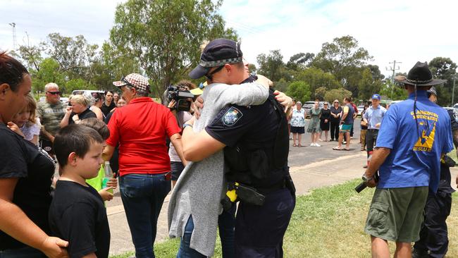 The township of Tara have come together to pay respects to local police officers killed overnight. Picture: NCA Newswire/ David Clark