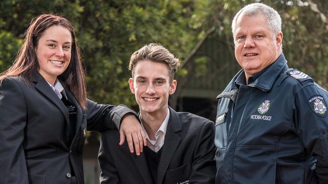 Students Maddy and Jared with Sen Sgt Mal McKern. Picture: Jake Nowakowski