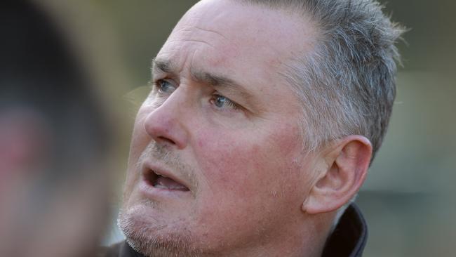 Des Ryan passing on some words of wisdom to his players. Picture: AAP/Chris Eastman