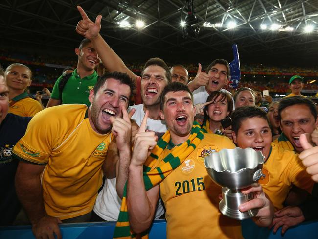 SYDNEY, AUSTRALIA - JANUARY 31: Mathew Ryan of Australia celebrates with fans after Australia defeated Korea Republic during the 2015 Asian Cup final match between Korea Republic and the Australian Socceroos at ANZ Stadium on January 31, 2015 in Sydney, Australia. (Photo by Robert Cianflone/Getty Images)