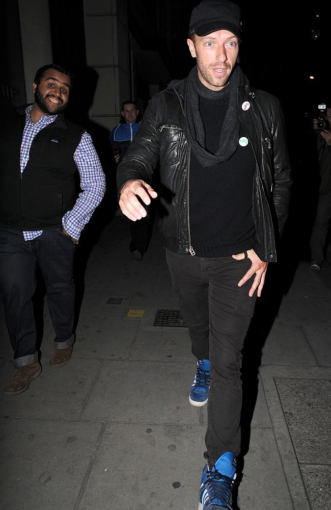 Chris Martin consciously uncoupled from the party as did his best to dodge the paparazzi.