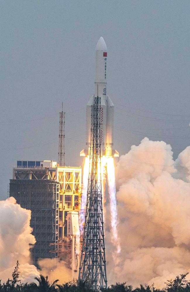 A Long March 5B rocket, carrying China's Tianhe space station core module, lifts off from the Wenchang Space Launch Center in southern China's Hainan province on April 29, 2021. (Photo by STR / AFP