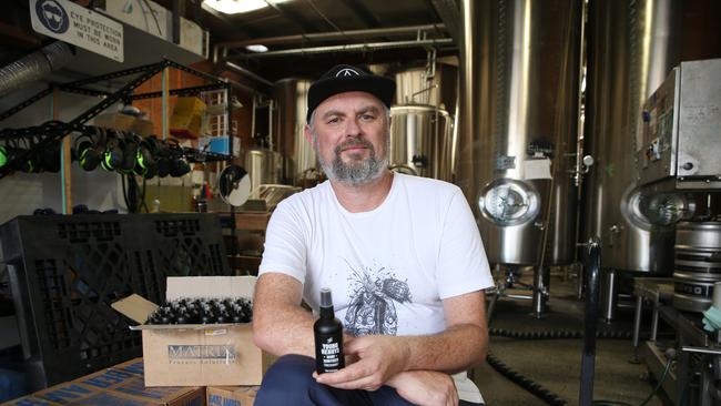 03/04/2020. Richard Adamson co-owner of Young Henry's pictured at their distillery in Newtown in Sydney's inner-west. They have started making hand sanitiser, created by distilling beer that will no longer be going to pubs and have just completed their second batch. Britta Campion / The Australian