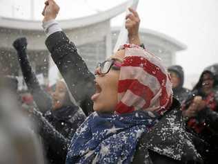 Khulud Fidama, 26, of Dearborn, Michigan, stands with her family outside the McNamara Terminal at Detroit Metropolitan Airport to speak against President Donald Trump's travel ban on refugees and citizens of seven Muslim-majority nations. Picture: Elaine Cromie