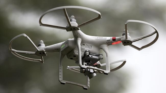 New laws coming to Queensland will regulate surveillance devices, including cameras mounted on aerial drones.