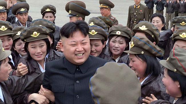 Kim Jong-un gets mobbed by ladies. Cracks a smile | Herald Sun