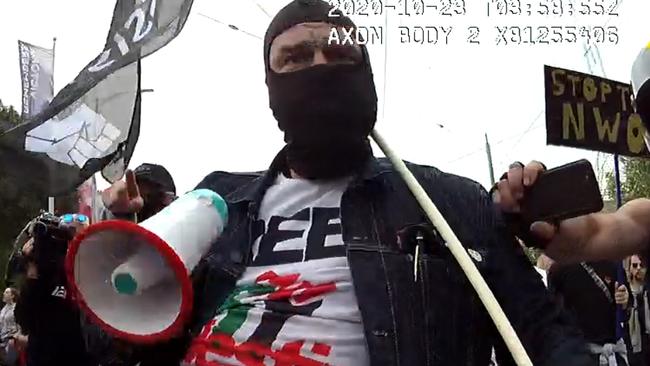 Basic wearing a black balaclava and a ‘Free Palestine’ T-shirt during the rally. Picture: County Court of Victoria