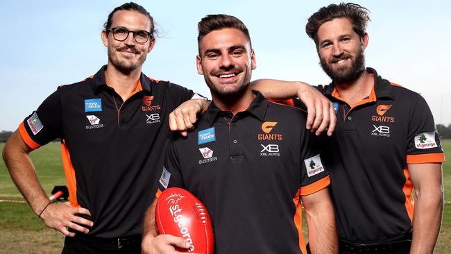 Callan Ward (right) with Phil Davis (left) and Stephen Coniglio, who have all captained the Giants. Picture: Phil Hillyard