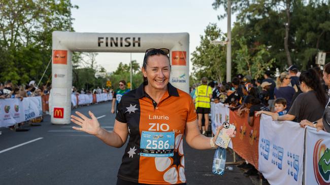 Laurie Zio crossing the finish line at the 2025 edition of the annual NT City2Surf, Sunday, June 1. Picture: Pema Tamang Pakhrin