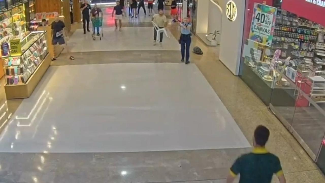 Moment hero cop guns down killer