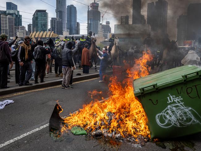 Protesters created a burning barricade on Wednesday. Picture: Jake Nowakowski