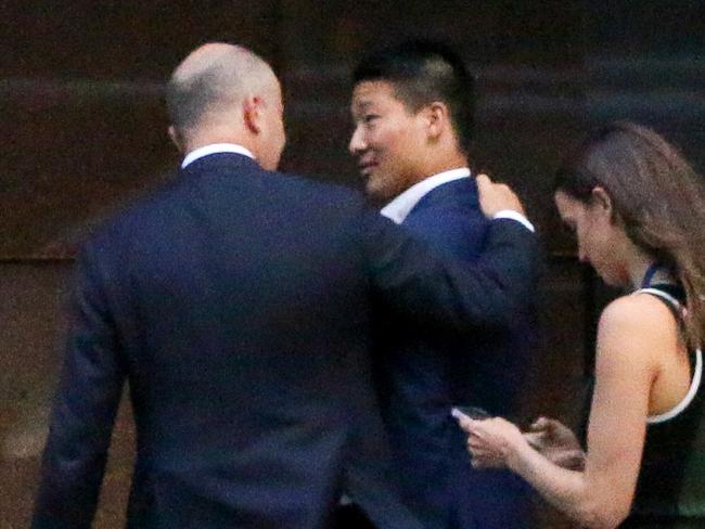 SAUCE Treasurer Matt Kean spotted with his arm around businessman Scott Yung who was last week being wooed by the Liberals to run against Labor leader Chris Minns in the seat of Kogarah. , Upper House MP Peter Poulos and Multicultural Minister Mark Coure were also spotted walking in to 52 Martin Place around the time the meeting with Yung was to be held.  SAUCE.