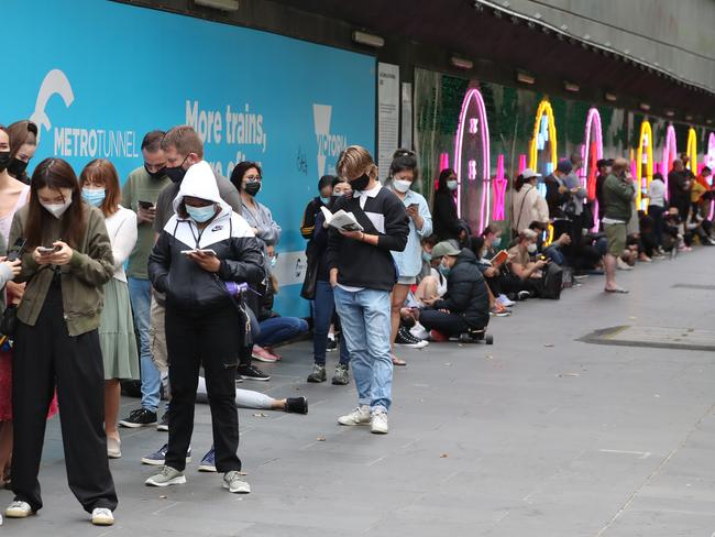 Crowds queue for Covid testing at Melbourne Town Hall. Picture: David Crosling