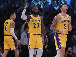 LOS ANGELES, CA - OCTOBER 22: LeBron James #23 of the Los Angeles Lakers celebrates his basket in overtime between Lonzo Ball #2 and Kyle Kuzma #0 during a 143-142 loss to the San Antonio Spurs at Staples Center on October 22, 2018 in Los Angeles, California. (Photo by Harry How/Getty Images)