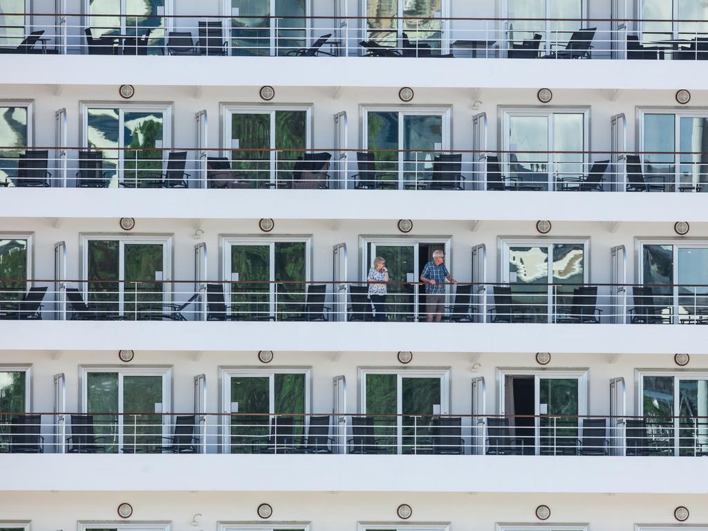 Passengers and crew disembark at Darwin. Picture GLENN CAMPBELL