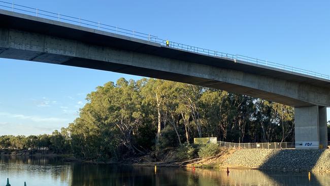 The guards have been seen on the bridge after-hours and are one measure, among a string, used to deter swimmers from illegally accessing the site still under construction. Picture: Submitted