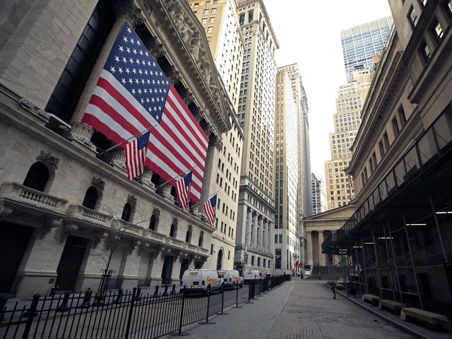 NEW YORK, NEW YORK - APRIL 25: The Fearless Girl statue stands nearly alone in front of the New York Stock Exchange near Wall Street during the coronavirus pandemic on April 25, 2020 in New York City. COVID-19 has spread to most countries around the world, claiming over 200,000 lives with infections close to 2.9 million people.   Justin Heiman/Getty Images/AFP == FOR NEWSPAPERS, INTERNET, TELCOS & TELEVISION USE ONLY ==