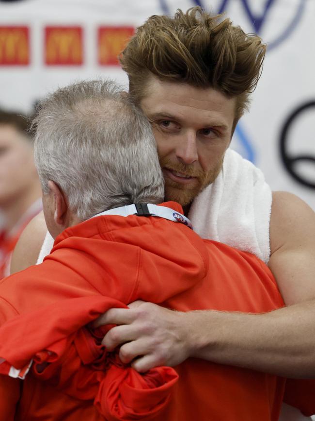 Dane Rampe is comforted post-match. Picture: Daniel Pockett/AFL Photos/Getty Images