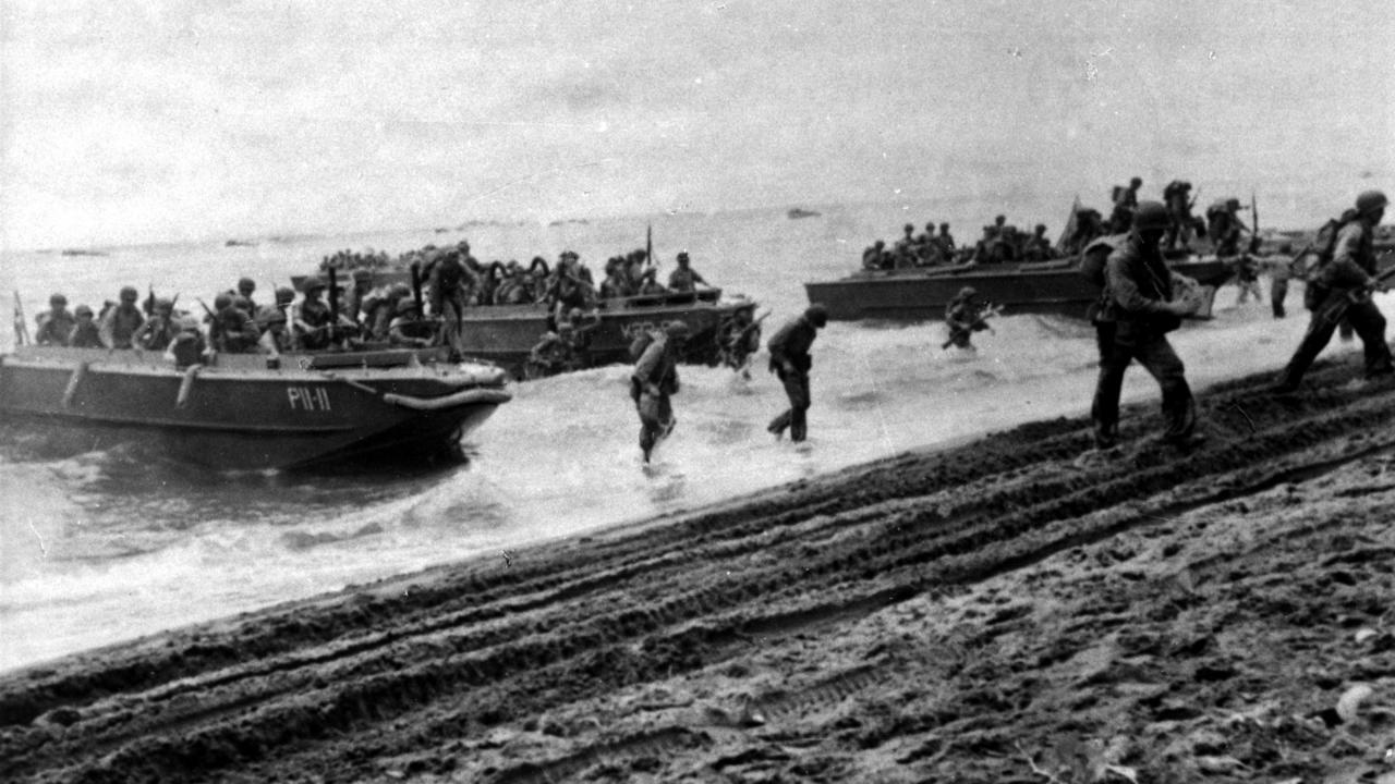 Six months after the Bombing of Darwin, Allied forces stormed the beaches of Guadalcanal, the “high watermark” of the Japanese Empire. USA / Armed Forces / Marine / WWII Historical