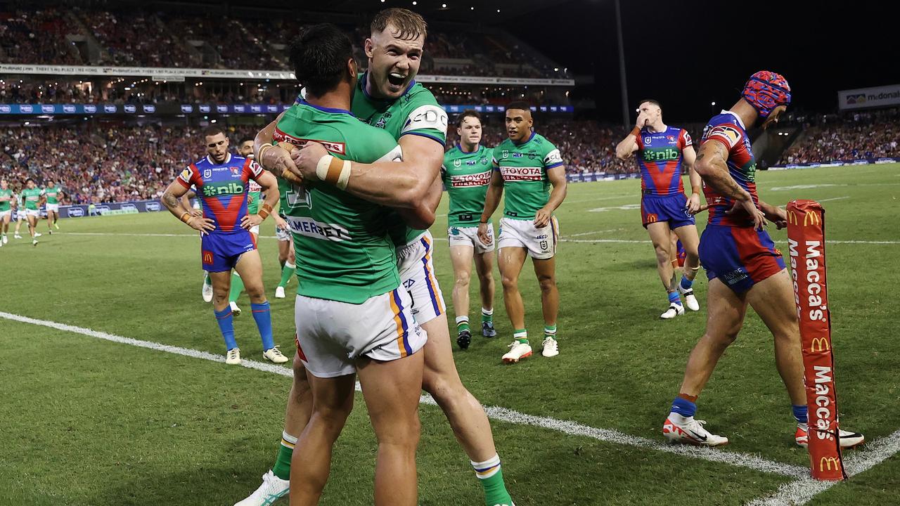 NEWCASTLE, AUSTRALIA - MARCH 07: Jordan Rapana of the Raiders celebrates with Hudson Young of the Raiders after scoring a try during the round one NRL match between Newcastle Knights and Canberra Raiders at McDonald Jones Stadium on March 07, 2024, in Newcastle, Australia. (Photo by Brendon Thorne/Getty Images)