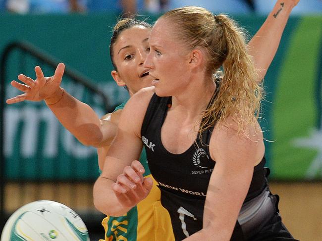 SPORT - Australian Diamonds v New Zealand - Constellation Cup netball series. Perth Arena. Photo by Daniel Wilkins. PICTURED - Silver Ferns Laura Langman gets a pass past Diamond's Kimberley Ravaillion during the third