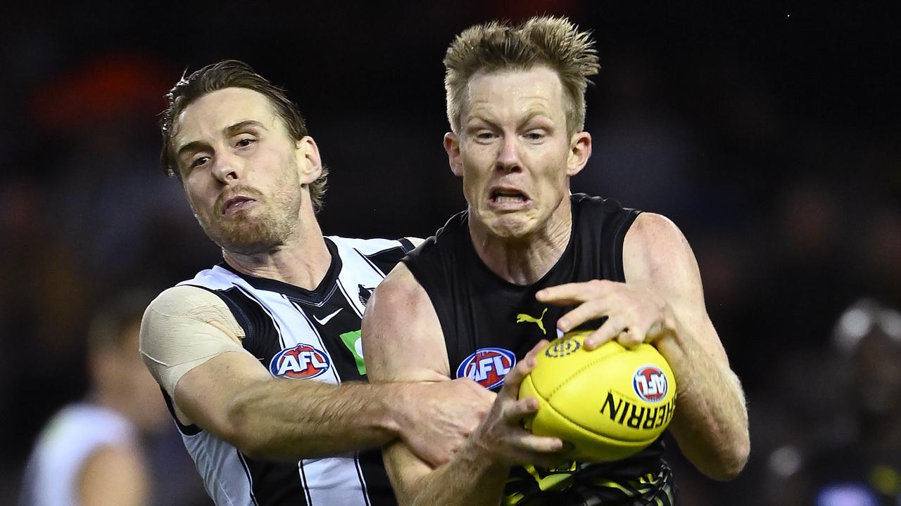 Jack Riewoldt marks in front of Jordan Roughead during the AFL Community Series match between Collingwood and Richmond. (Photo by Quinn Rooney/Getty Images)