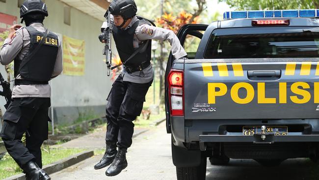 Armed police arrive at Bangli jail today. Picture: Liam Kidston.