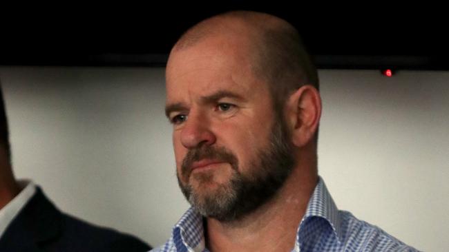 Former player and football director Mark Ricciuto looks on during a press conference at the Crows headquarters in Adelaide, Tuesday, October 15, 2019. Matthew Nicks has been announced as new head coach of the Adelaide Crows. (AAP Image/Kelly Barnes) NO