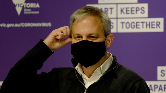 Victoria's Chief Medical Officer Brett Sutton with his mask at a press update today. Picture: Andrew Henshaw