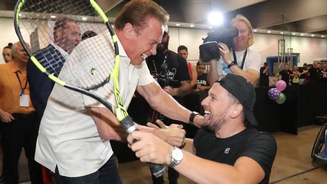 Four times Australian Open tennis champion Dylan Alcott invited Arnold Schwarzenegger play wheelchair tennis with him at the Arnold Sports Festival in Melbourne. Picture: Alex Coppel