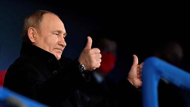 Russia's President Vladimir Putin gestures during the opening ceremony. Photo by WANG Zhao / AFP