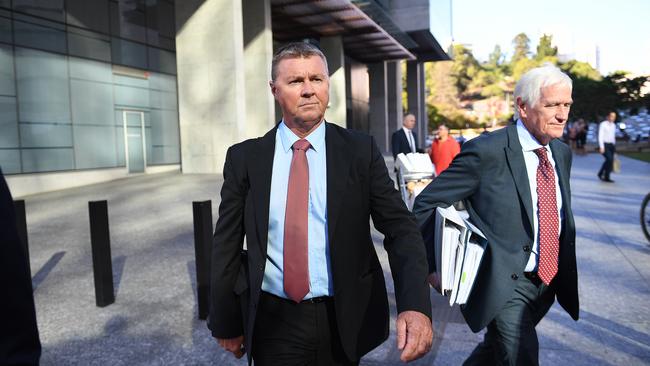 Dave Hanna leaves the District Court  in Brisbane, Monday, February 18, 2019. Hanna, a former CFMEU Queensland secretary is appearing on the opening day of a rape trial after an alleged incident at a woman's home after the pair met outside a bar in Brisbane's Fortitude Valley in March last year. (AAP Image/Dave Hunt)