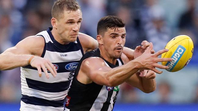 Joel Selwood and Scott Pendlebury had words with each other before and after the final siren. Picture: Getty