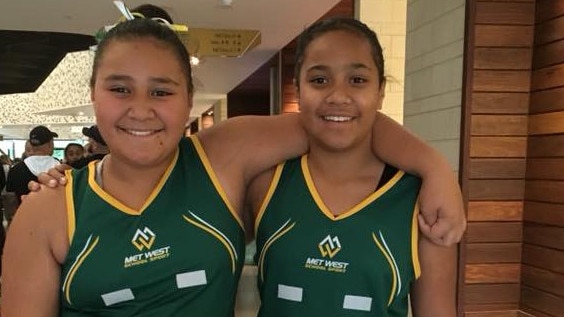 Woodcrest State College sisters Tianna and Armani in their met west netball uniform.