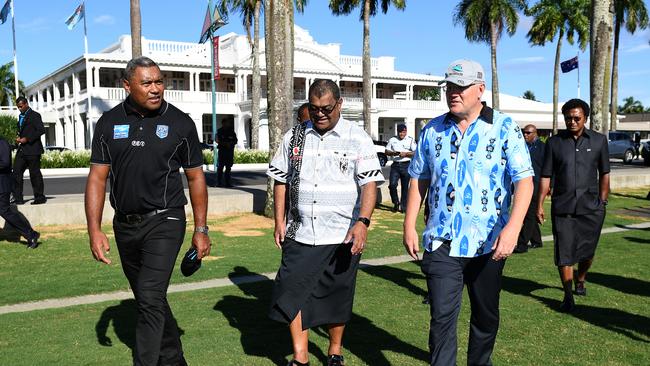 Australian Prime Minister Scott Morrison with former rugby league player Petero Civoniceva (left) and Executive Chair of Fiji National Rugby League Peni Musunanasi. Picture: AAP IMAGE