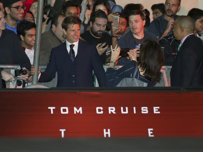 He happily posed for selfies. (AP Photo/Rick Rycroft)
