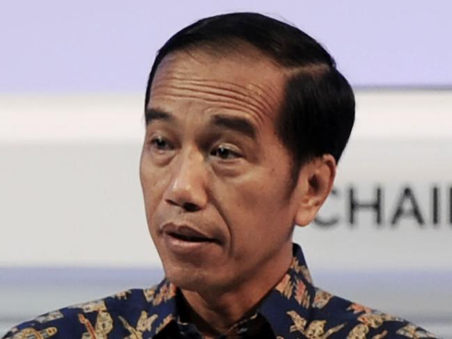 Indonesia President Joko Widodo delivers his speech at the International Monetary Fund (IMF) and World Bank annual meetings in Nusa Dua, on Indonesia's resort island of Bali on October 12, 2018. (Photo by SONNY TUMBELAKA / AFP)