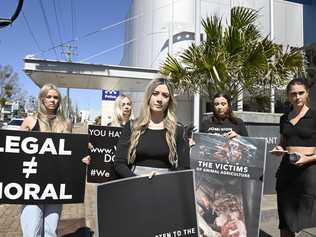 Vegan animal activist Hayley Adams (front) with supporters outside Toowoomba Courthouse after she was sentenced. Picture: Bev Lacey