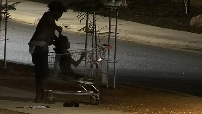 A man lifts a teenager by her hair and dumps her into a shopping trolley after an attack in which her leg was broken.