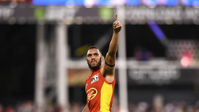 Suns player Harley Bennell reacts after the round 21 AFL match between the Gold Coast Suns and the Essendon Bombers at Metricon Stadium on the Gold Coast, Saturday, August 22, 2015. (AAP Image/Dave Hunt) NO ARCHIVING, EDITORIAL USE ONLY