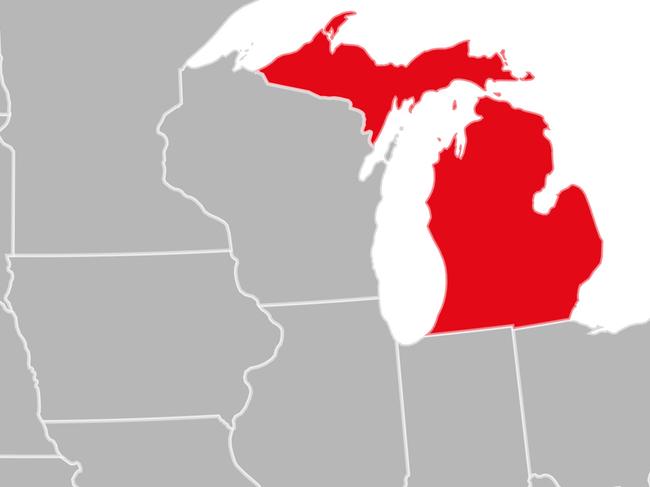 Michigan state highlighted on USA political map vector illustration. Gray background.