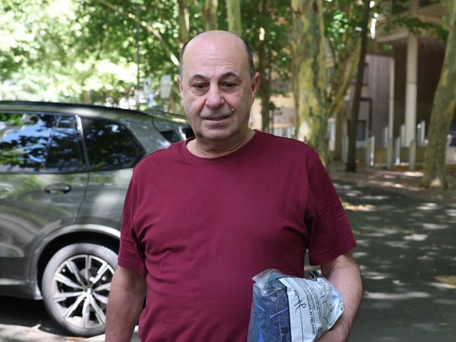 The Daily Telegraph 14.12.2024 Bail Release - Norberto Triemstra (wearing a red shirt). A man faced court after allegedly making a Nazi salute at a hotel in the CBD on Friday night..   Picture: Rohan Kelly