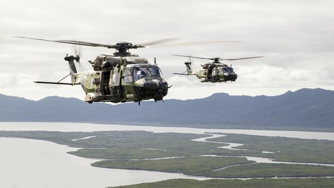 Australian Army MRH90 Taipans fly in formation deploying soldiers to Jungle Training Wing, Tully, Queensland during Exercise Kalimantan in 2022. Picture: Department of Defence