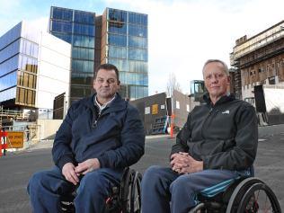 David Cawthorn and Jim Busby outside the Parliament Square development. Picture: LUKE BOWDEN