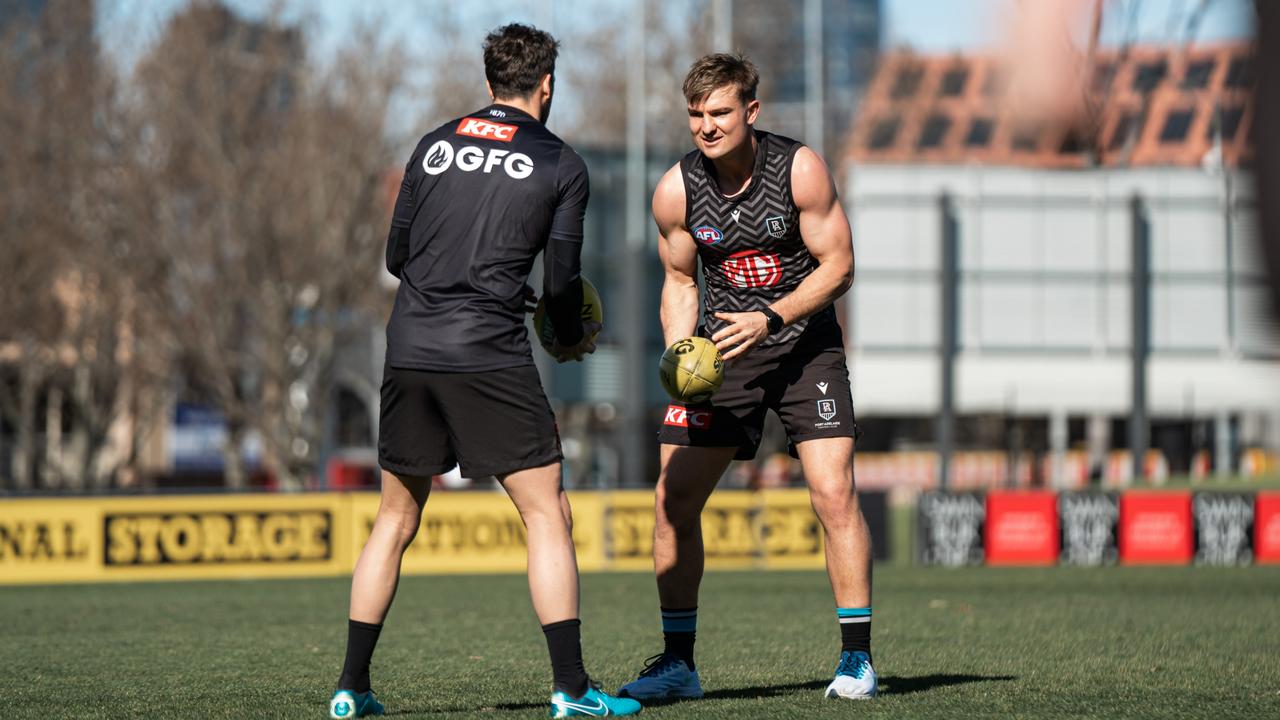 Travis Boak and Ollie Wines train at Punt Rd in Melbourne last week.