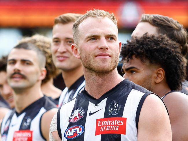 MELBOURNE, AUSTRALIA - APRIL 25: Tom Mitchell of the Magpies looks on during the Anzac Day observance ceremony during the 2023 AFL Round 06 match between the Collingwood Magpies and the Essendon Bombers at the Melbourne Cricket Ground on April 25, 2023 in Melbourne, Australia. (Photo by Dylan Burns/AFL Photos via Getty Images)