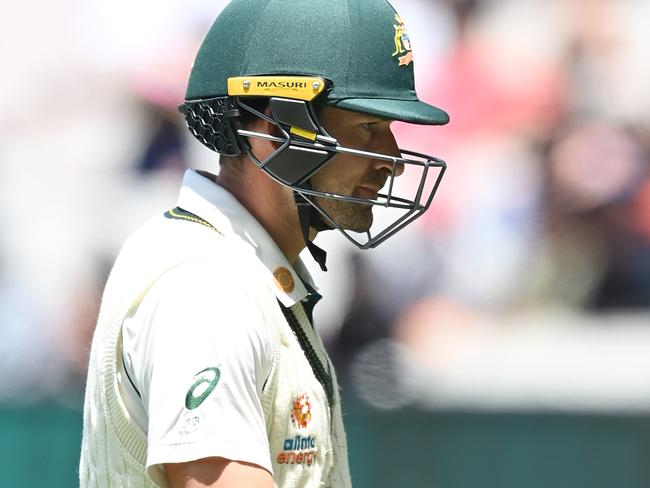 MELBOURNE, AUSTRALIA - DECEMBER 28: Joe Burns of Australia walks off the field after being dismissed by Umesh Yadav of India during day three of the Second Test match between Australia and India at Melbourne Cricket Ground on December 28, 2020 in Melbourne, Australia. (Photo by Quinn Rooney/Getty Images)